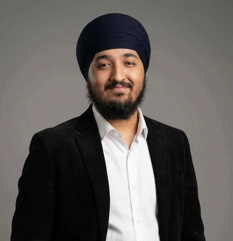 Portrait of Keerat Singh in a navy turban and black blazer